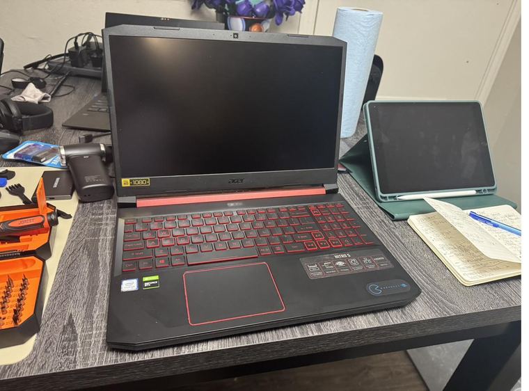 The same laptop clean and reassembled after service